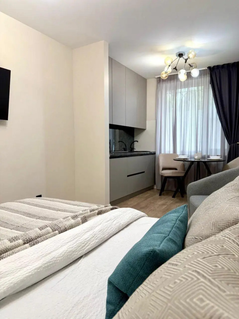 Современная студия в центре Апартаменты