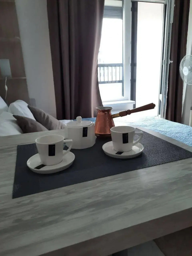 Квартира Уютная студия рядом с Лондон Моллом