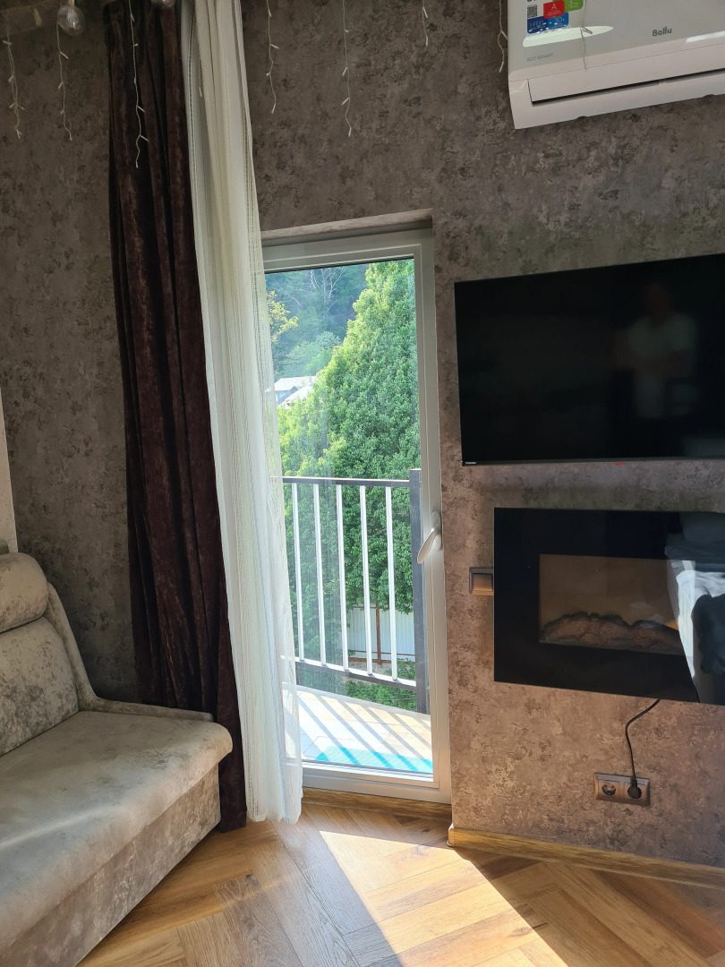 Апартаменты Квартира с Камином