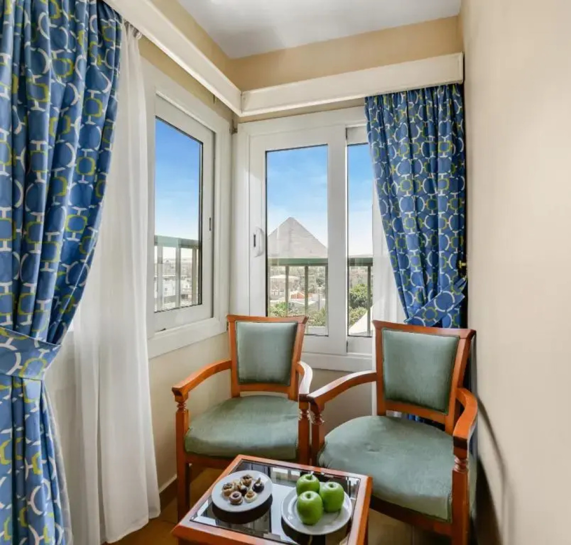 Отель Aura Inn Tiba Pyramids