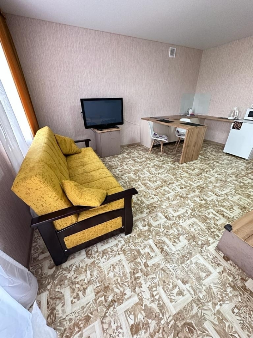 Квартира Уютная студия рядом с горoдской библиoтекой