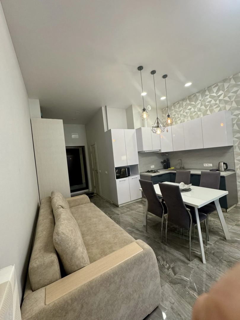 Квартира Просторная студия с террасой напротив отеля Мариотт