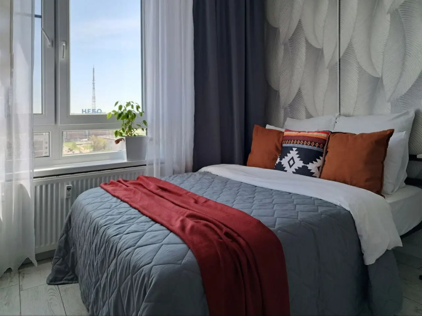 Апартаменты Wing Tower - высотная студия в центре