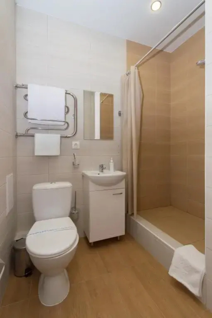 Апартаменты Мини студия в Центре с кухней, душем и большим окном