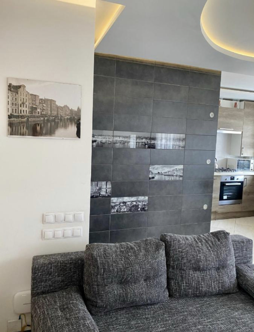 Апартаменты Уютная современная квартира в историческом центре города