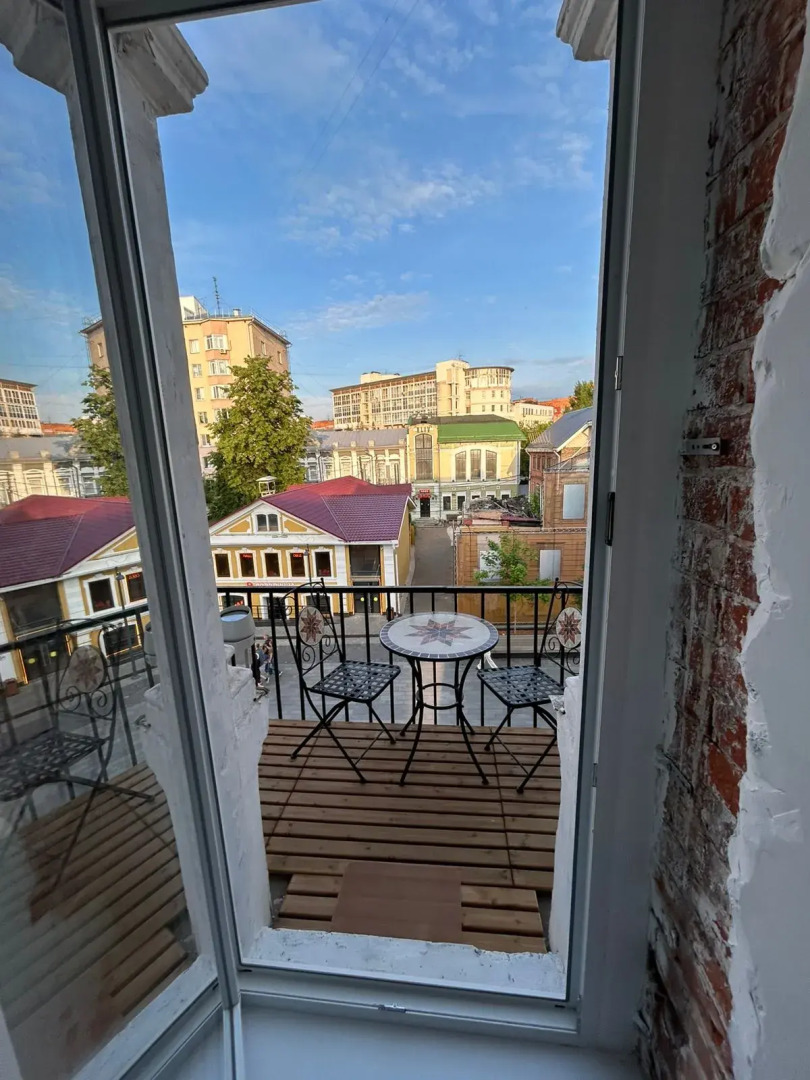Квартира Уютный Лофт с балконом на главной улице Столицы Закатов