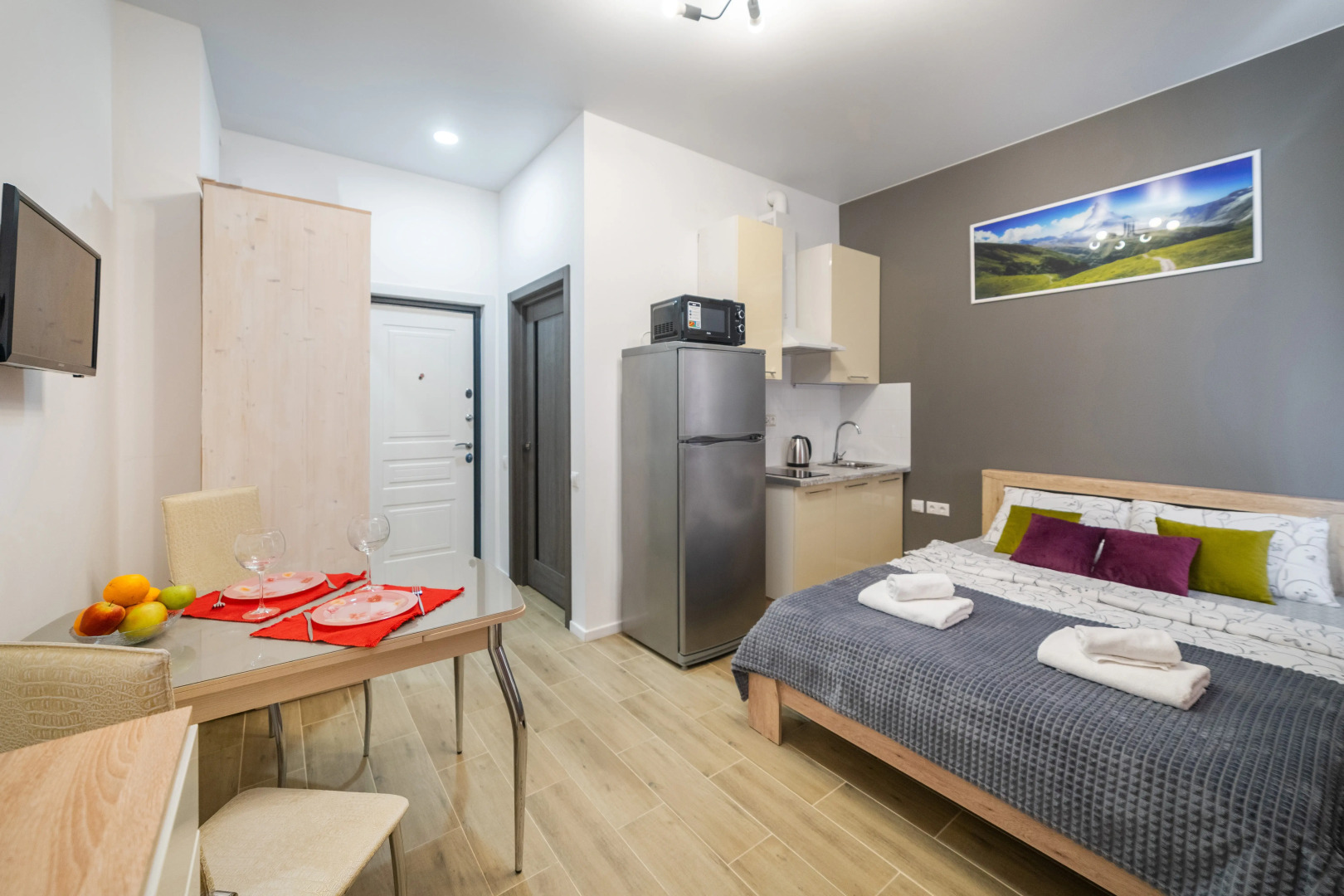 Апартаменты Просторная студия с балконом и видом на горы