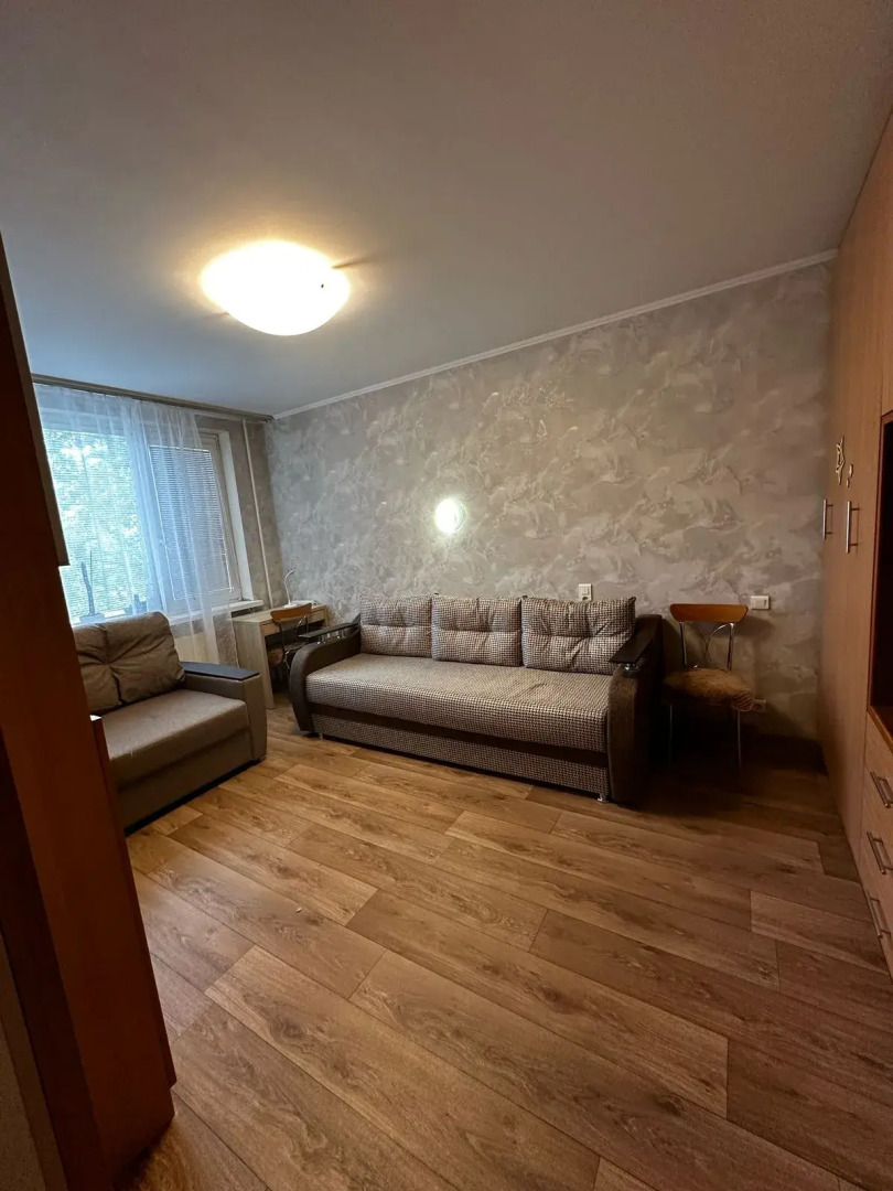 Апартаменты Уютная квартира в зеленом дворе