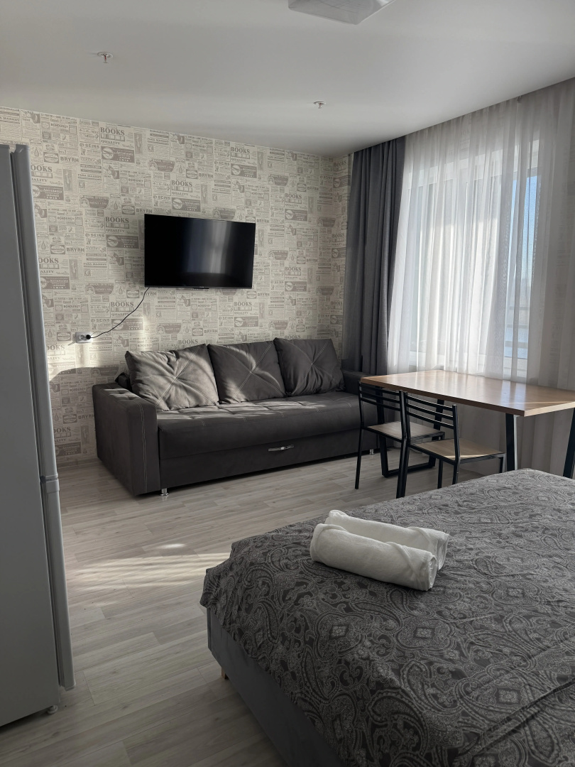 Апартаменты Hugge Place Студия с видом на ОБЬ