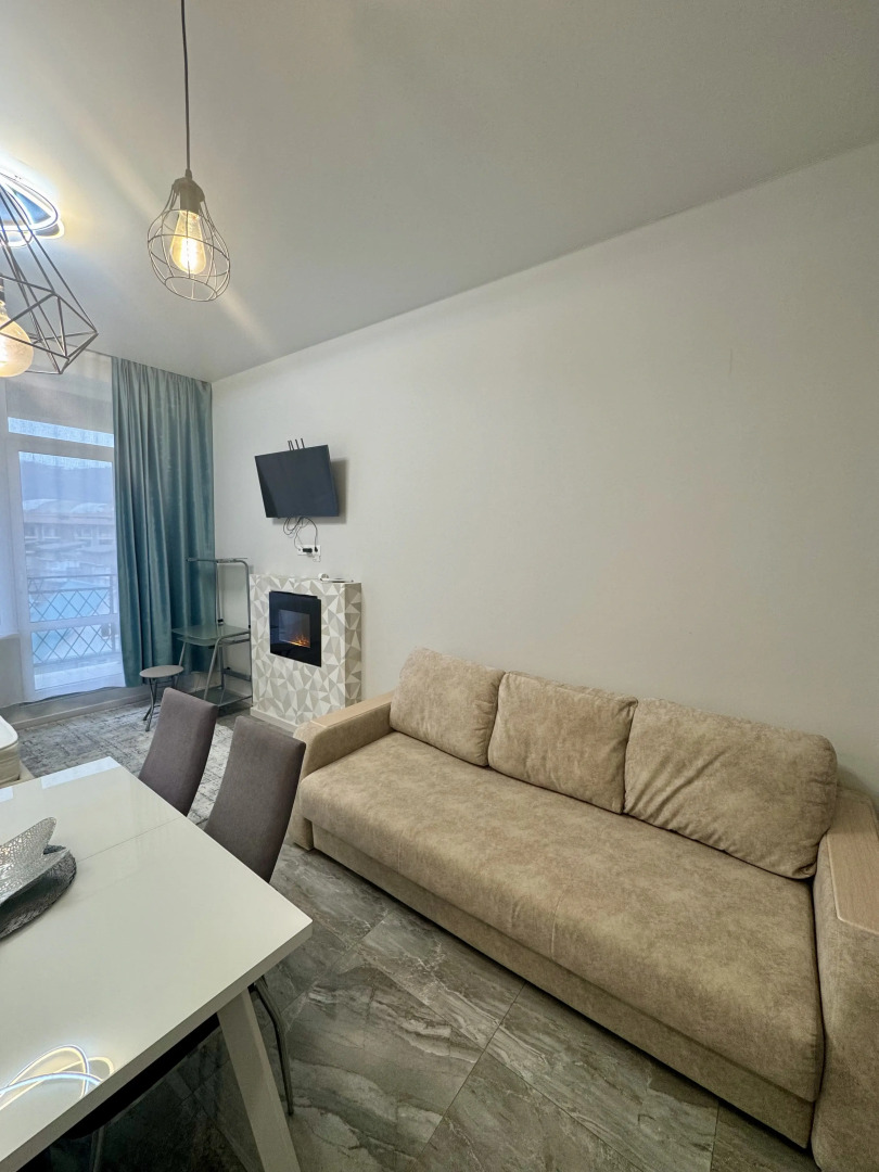 Квартира Просторная студия с террасой напротив отеля Мариотт