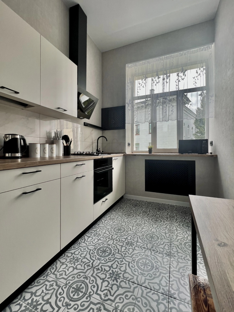 Апартаменты Светлая двухкомнатная квартирка возле ЦУМа