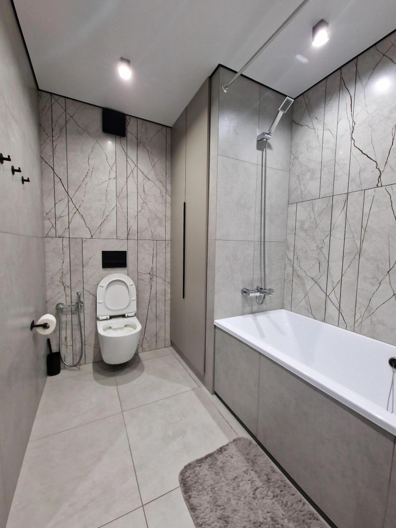 Апартаменты в Центре с Гостинной и 2 Спальнями