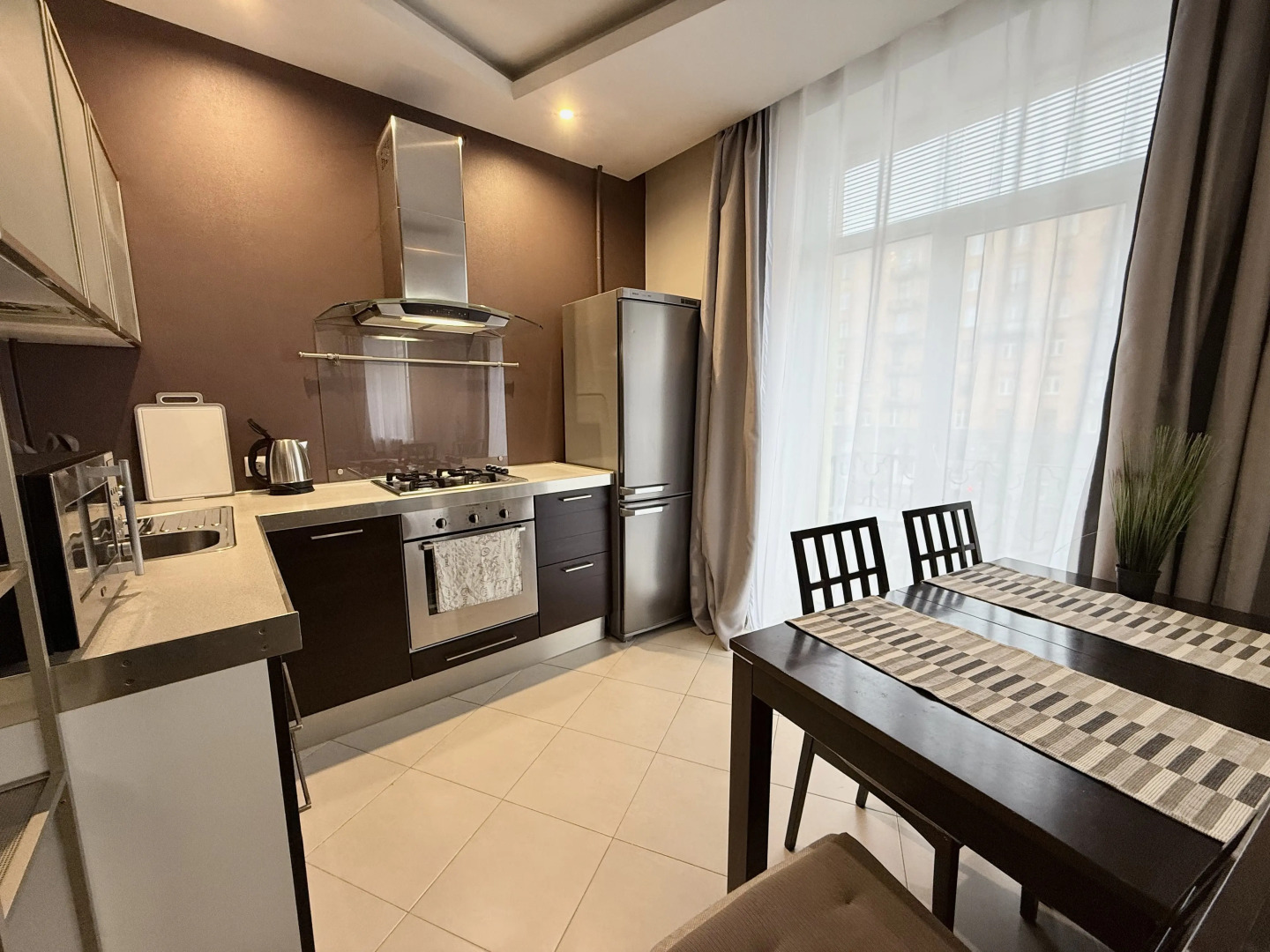 Апартаменты Уютная двухкомнатная квартира рядом с ЦУМом