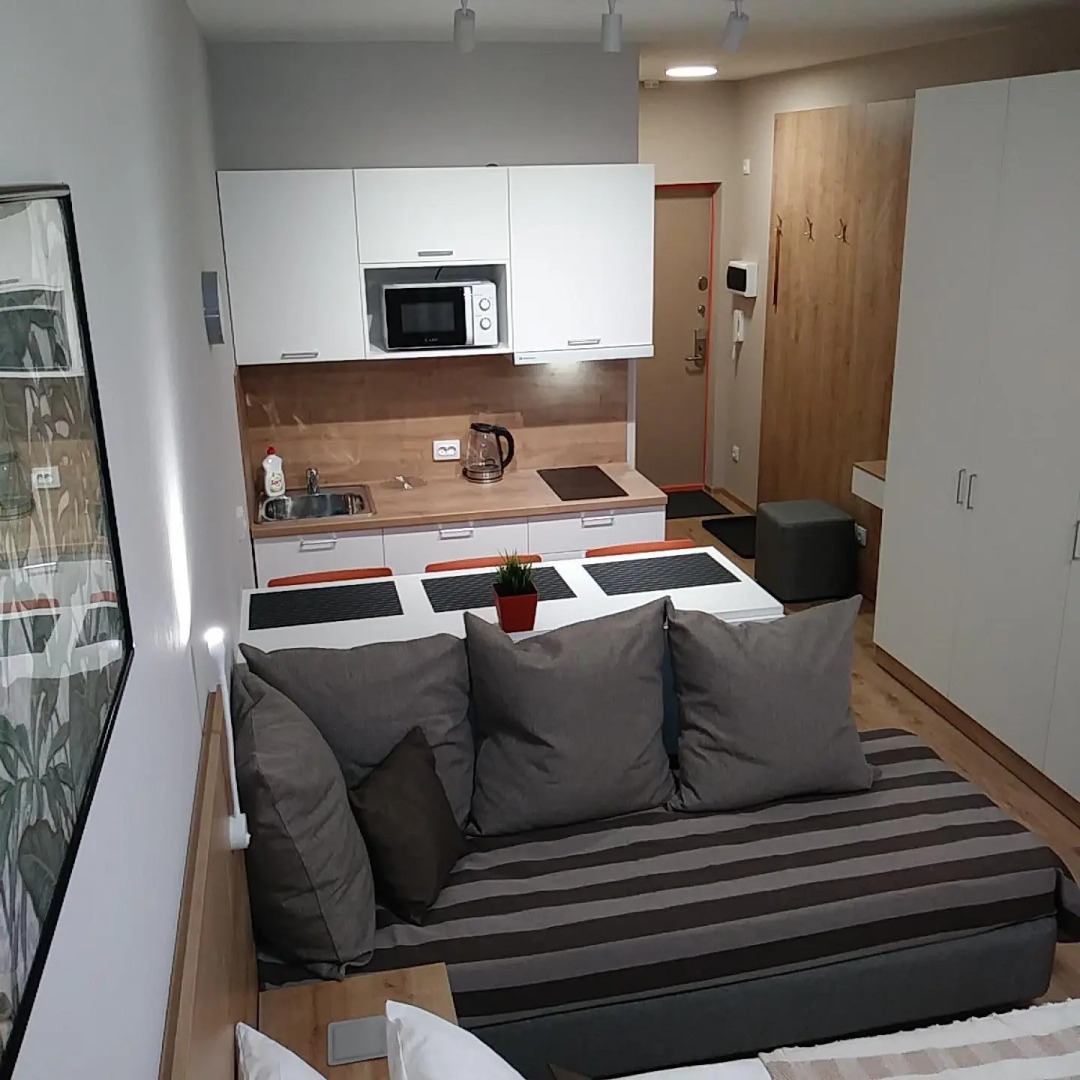 Апартаменты Уютная Студия с панорамным видом на город рядом с метро Парнас