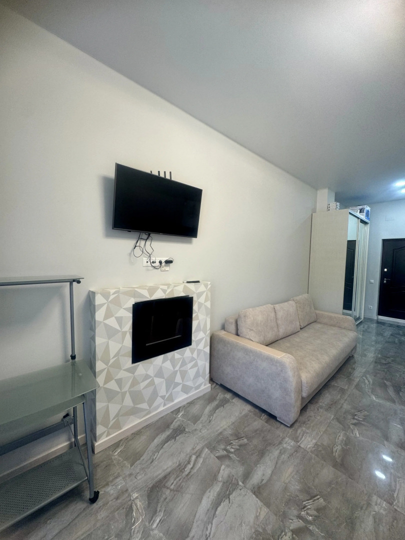 Квартира Просторная студия с террасой напротив отеля Мариотт