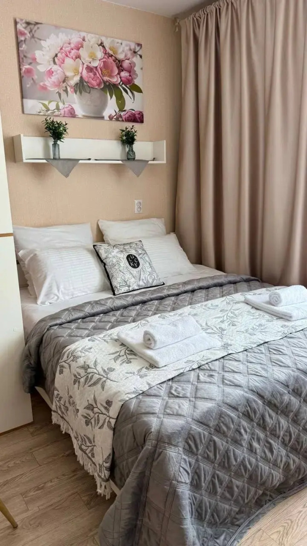 Квартира Уютная студия в 5 минутах от ТРЦ Планета