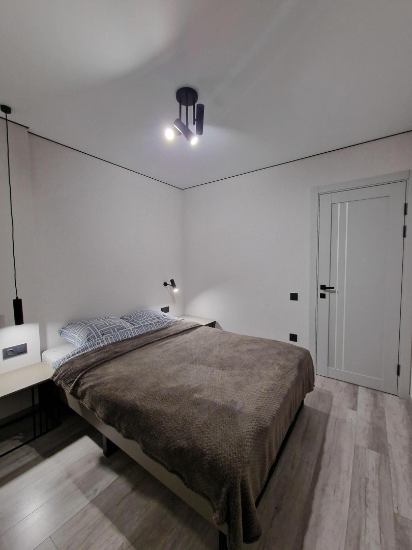 Апартаменты в Центре с Гостинной и 2 Спальнями