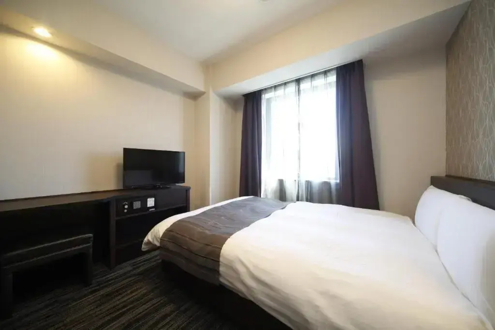 Отель Dormy Inn Kofu Marunouchi