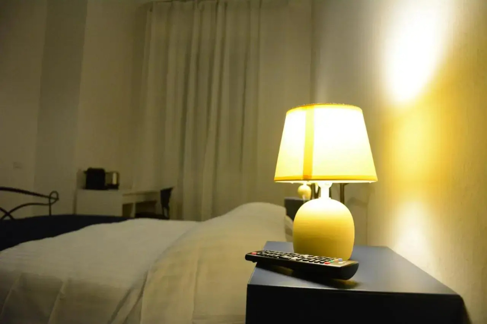 Отель Mambo Suites