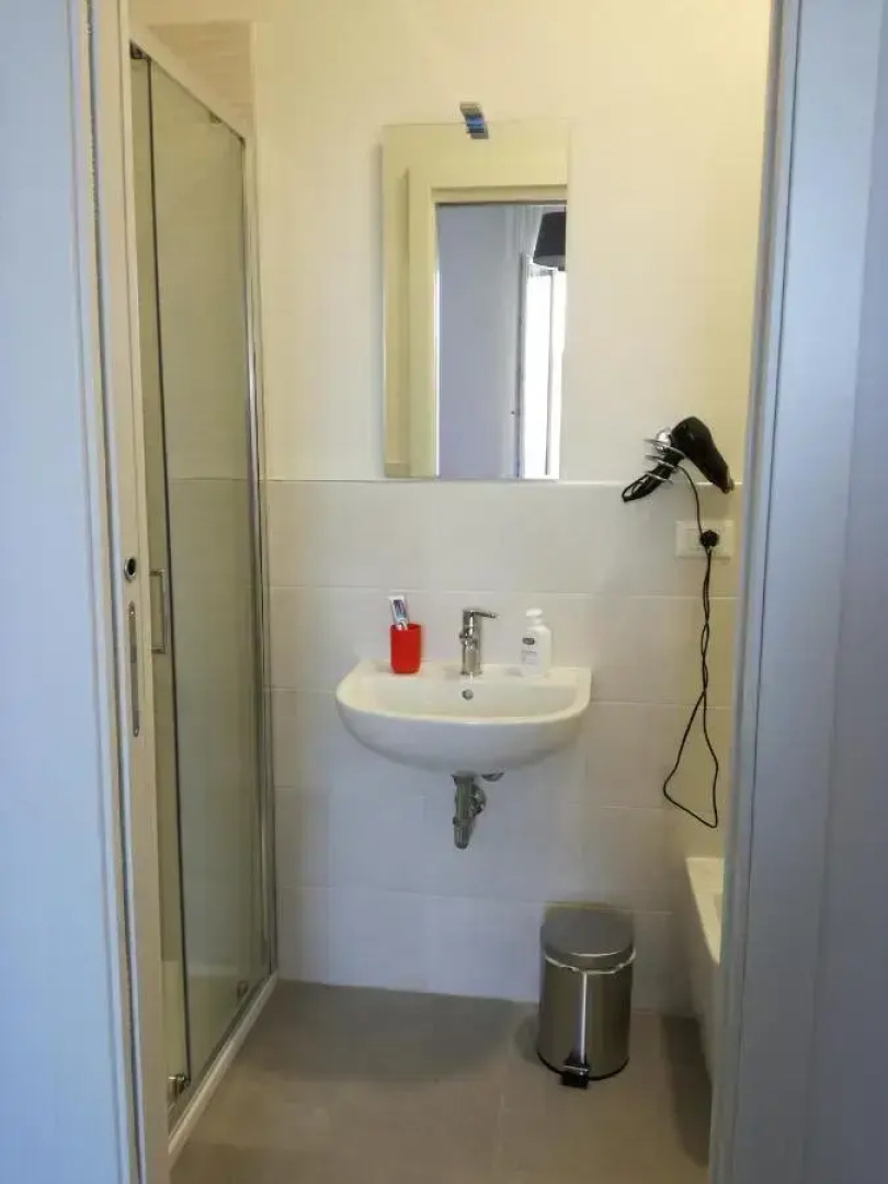 Отель Mambo Suites