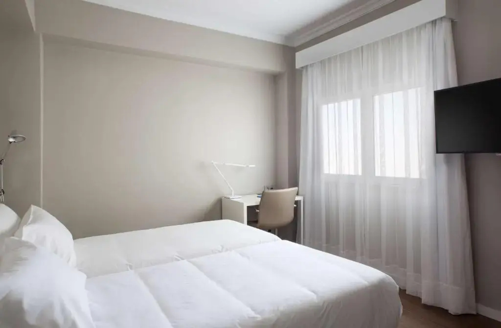 Отель NH Las Palmas Playa las Canteras