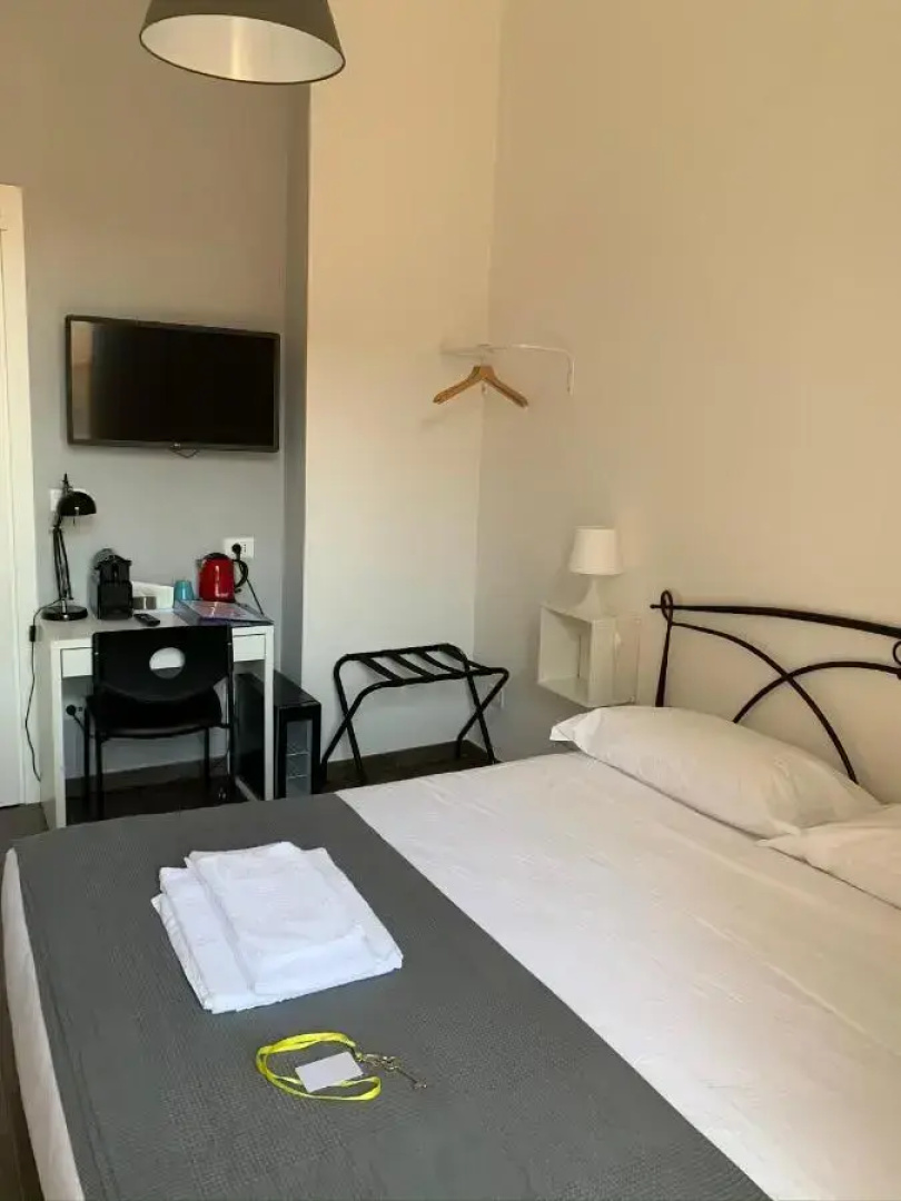 Отель Mambo Suites