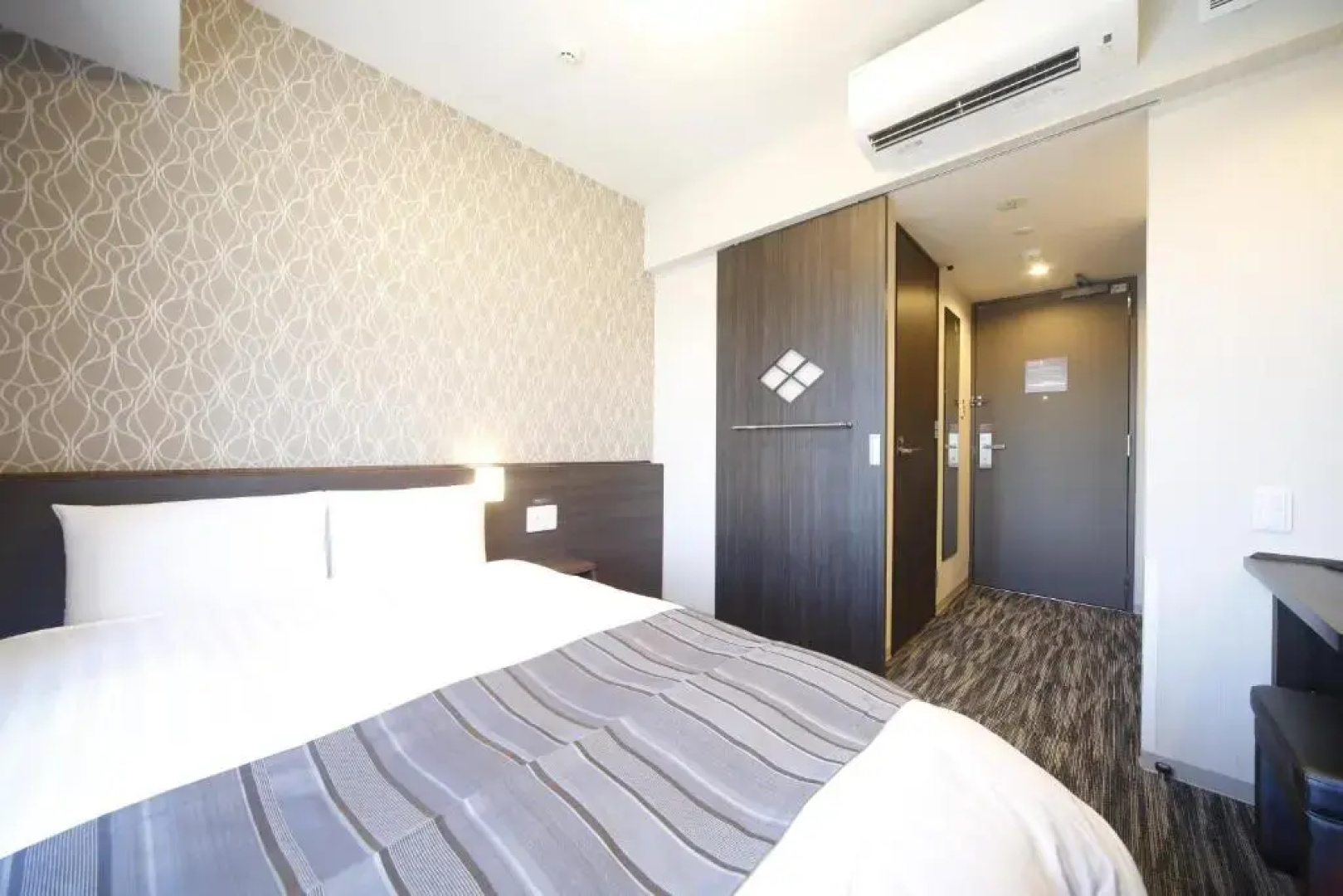 Отель Dormy Inn Kofu Marunouchi