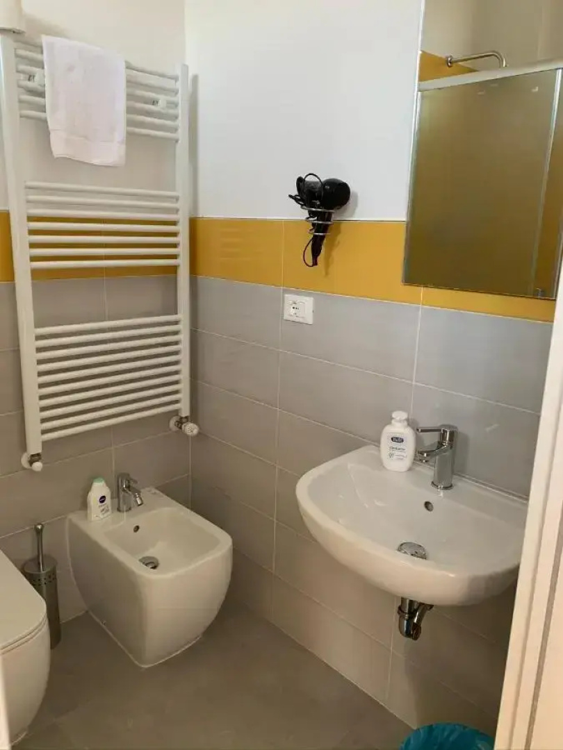 Отель Mambo Suites