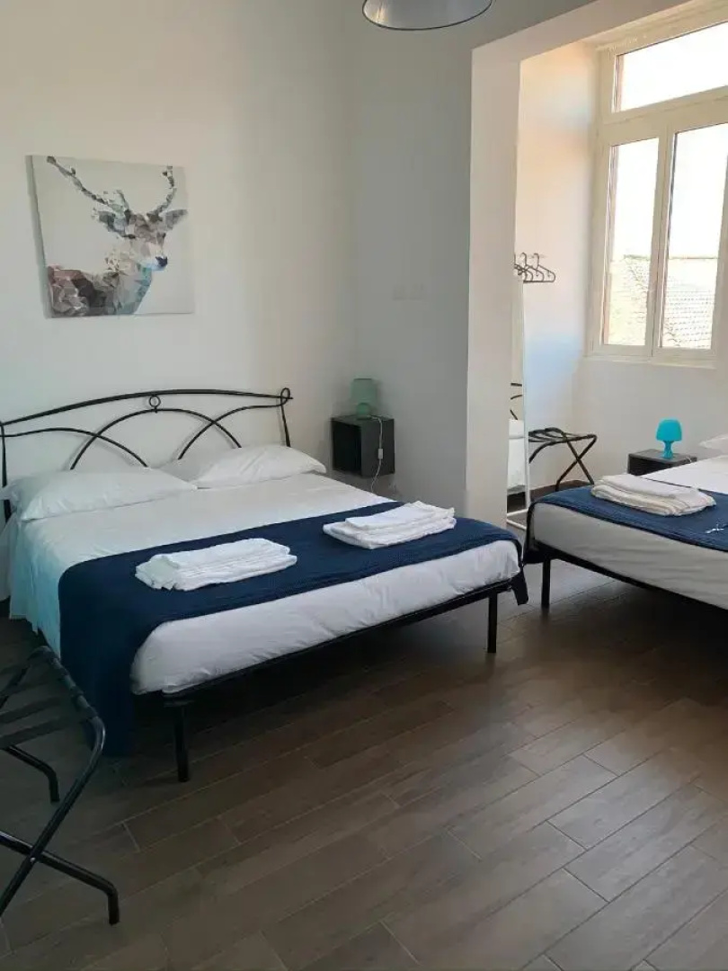 Отель Mambo Suites