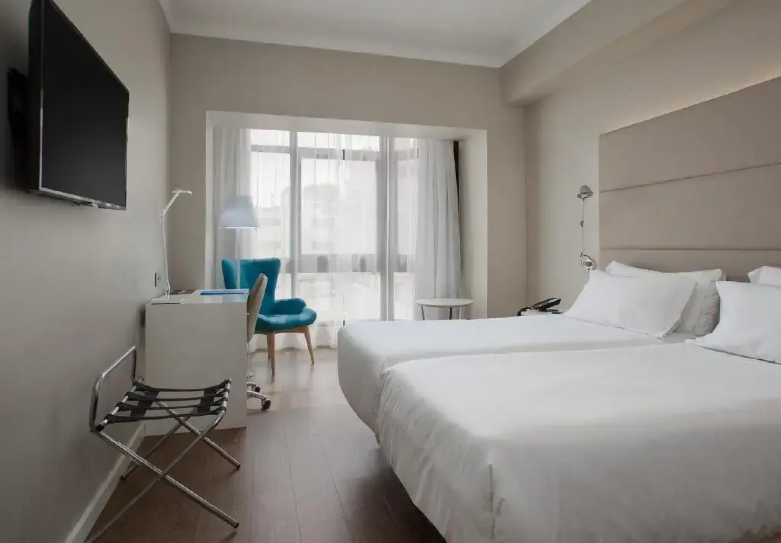 Отель NH Las Palmas Playa las Canteras