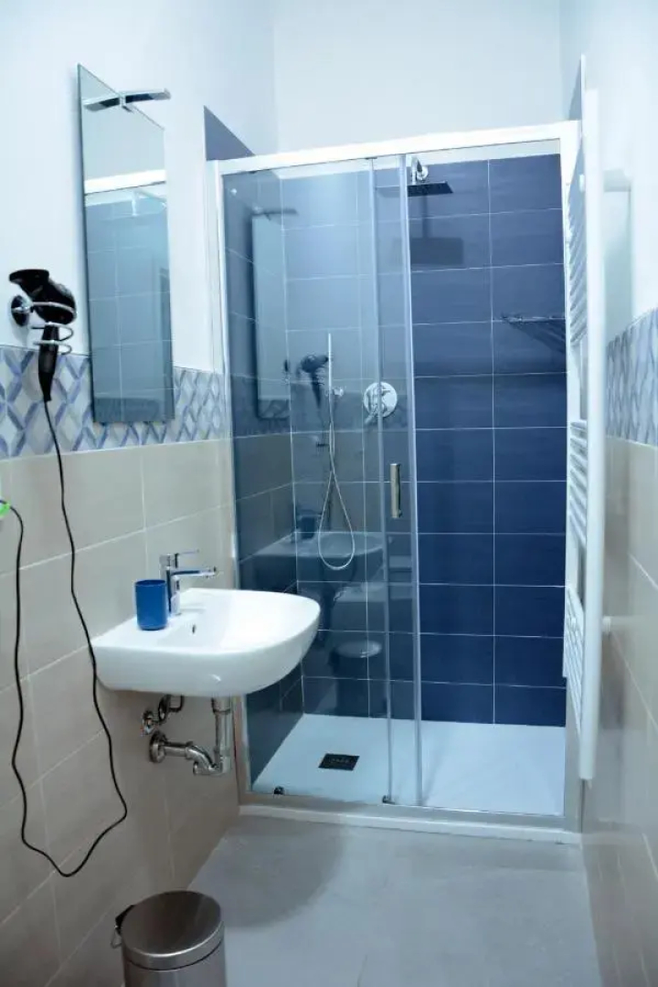 Отель Mambo Suites