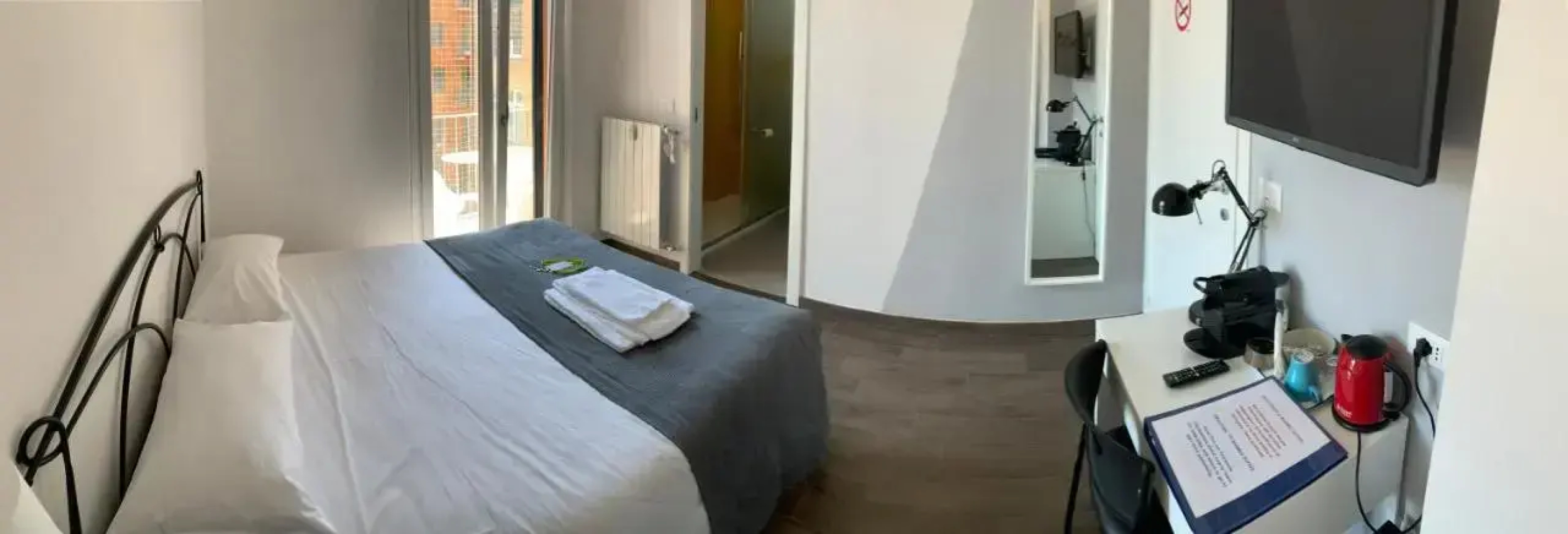 Отель Mambo Suites