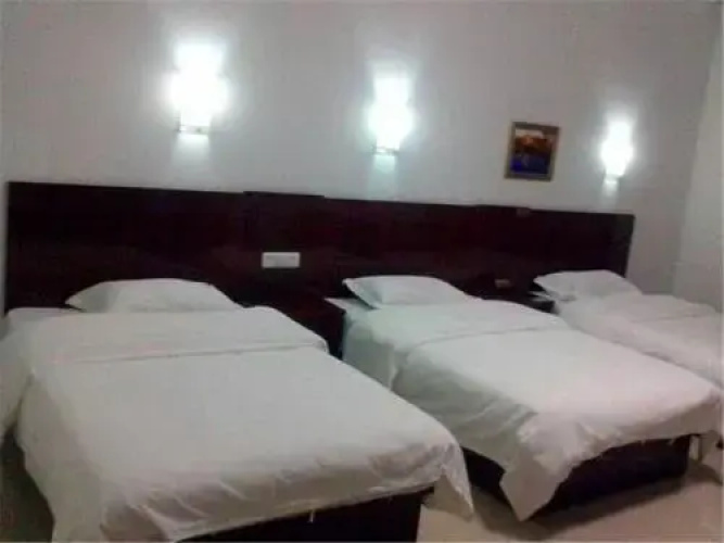Ejinaqi Jinse Shengdian Business Inn