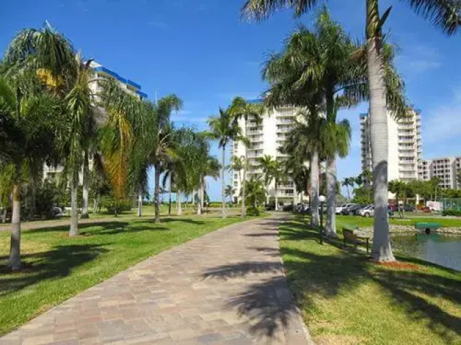Estero Beach & Tennis #1006C by RedAwning