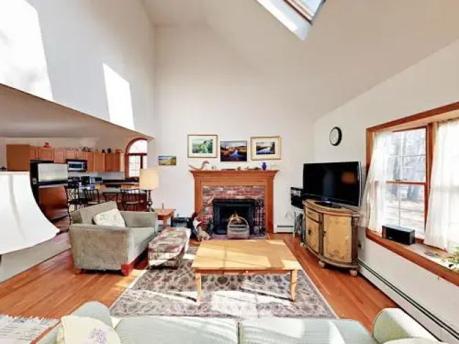 Woodsy Cape Cod Home by RedAwning