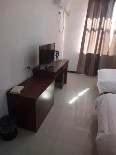 Ejinaqi Jinse Shengdian Business Inn