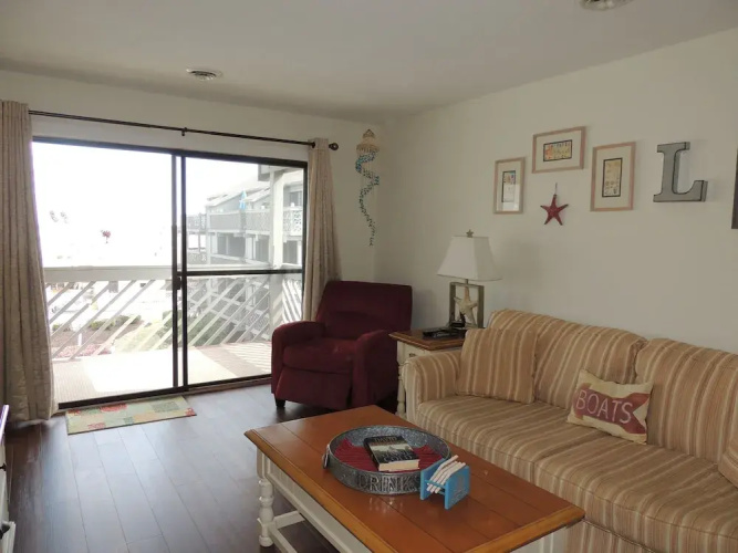 Shipwatch Pointe I #E207 2nd Row & Beyond (P) by RedAwning