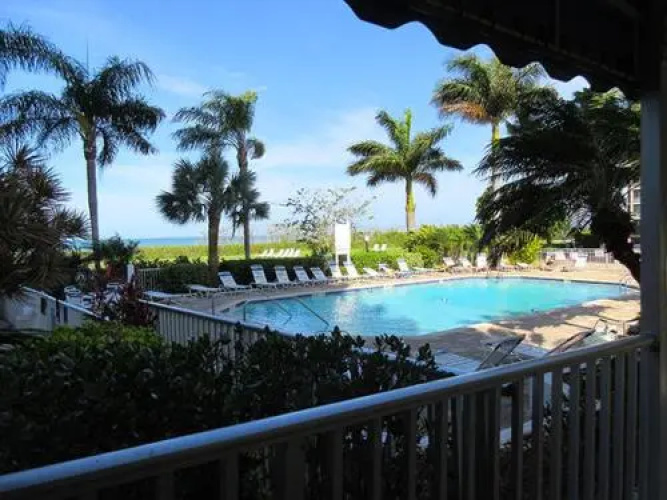 Estero Beach & Tennis #1006C by RedAwning