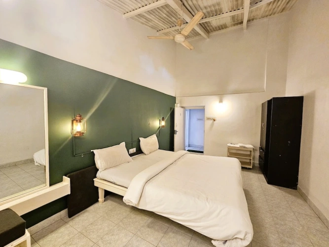 Family Studio with balcony and with garden view
