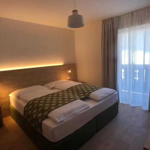 Deluxe Quadruple room with balcony and with mountain view