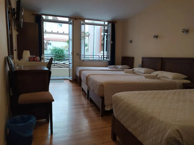 Standard Quadruple room with balcony and with city view