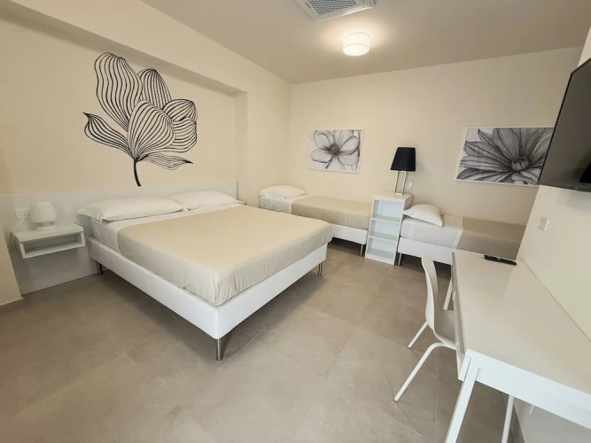 Deluxe Quadruple room with garden view