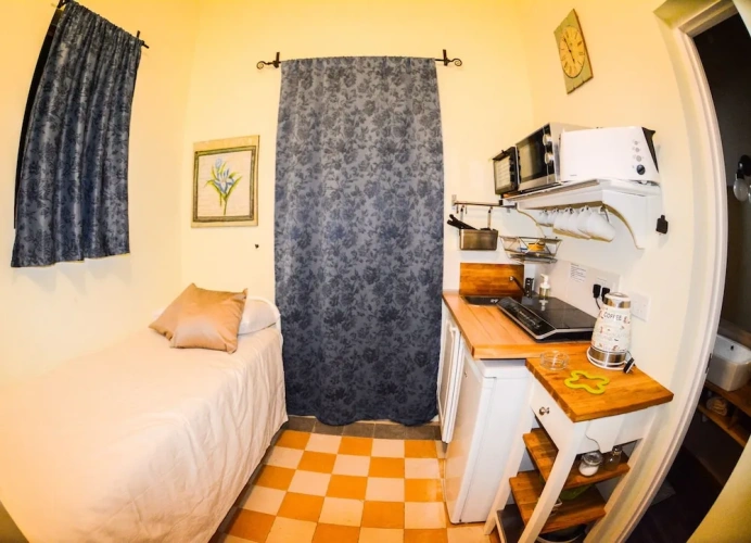 Standard Triple room with balcony and with garden view