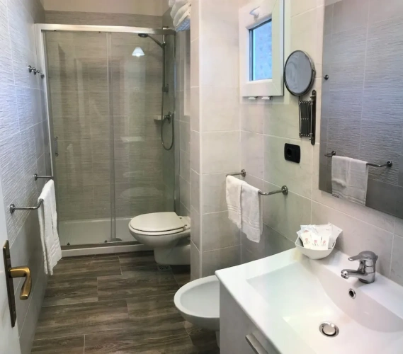 Deluxe Quadruple room with balcony