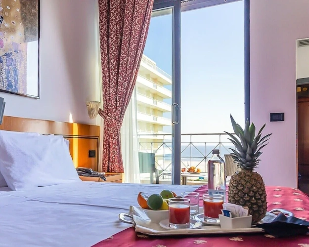 Deluxe Triple room with balcony and with sea view
