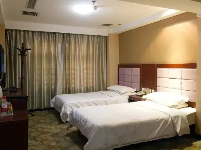 Qi Jinbaihui Business Hotel