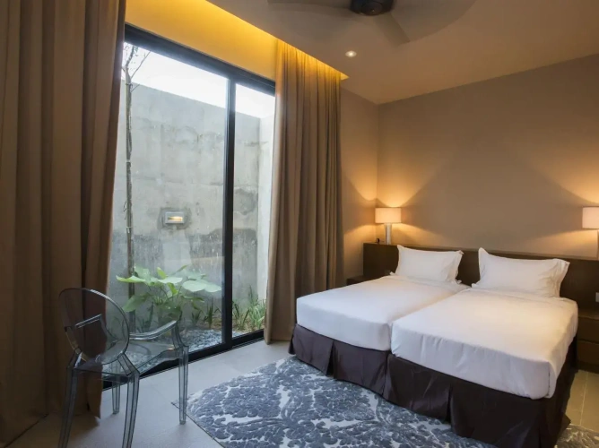 Standard Twin room with garden view