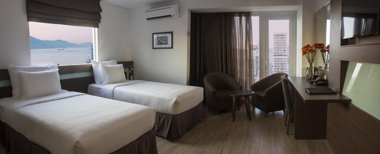 Executive Triple room with balcony and with city view