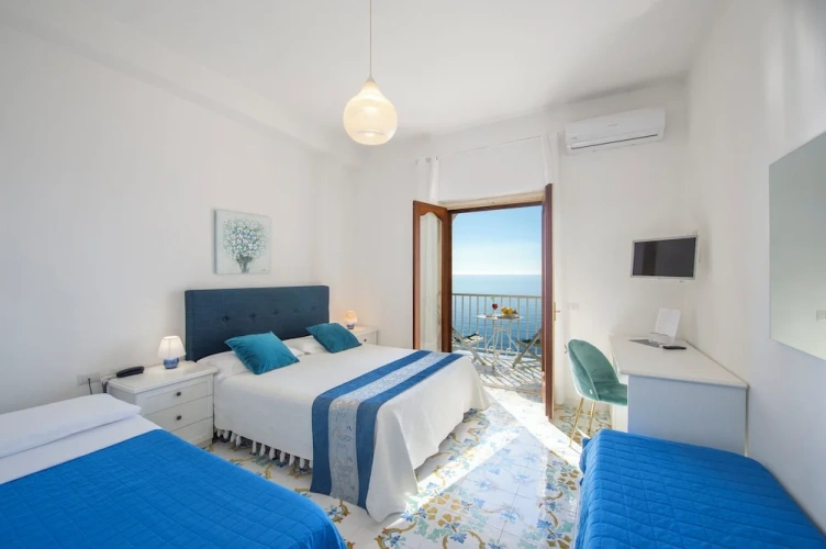 Standard Quadruple room with balcony and with sea view