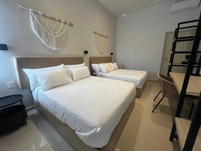 Standard Quadruple room with courtyard view